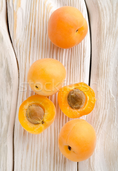 Table blanche bois fruits orange [[stock_photo]] © Givaga