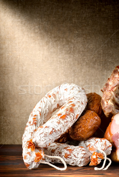 Et ürünleri pişmiş sosis eski tablo Stok fotoğraf © Givaga