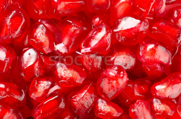 Pomegranate seeds background Stock photo © Givaga