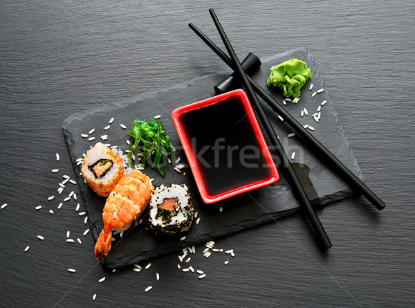 Stock photo: Delicious sushi with sauce