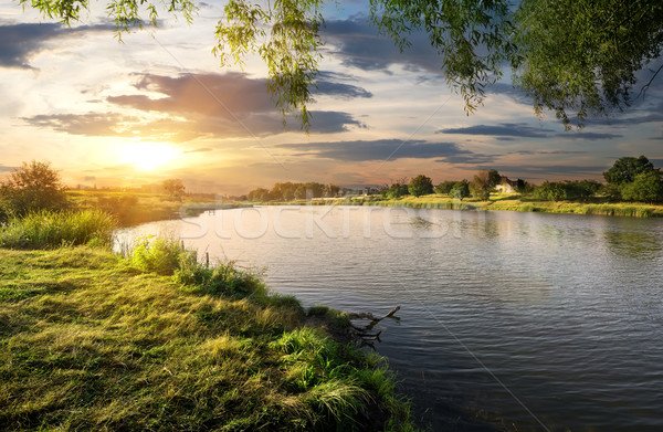 Sundown over river Stock photo © Givaga