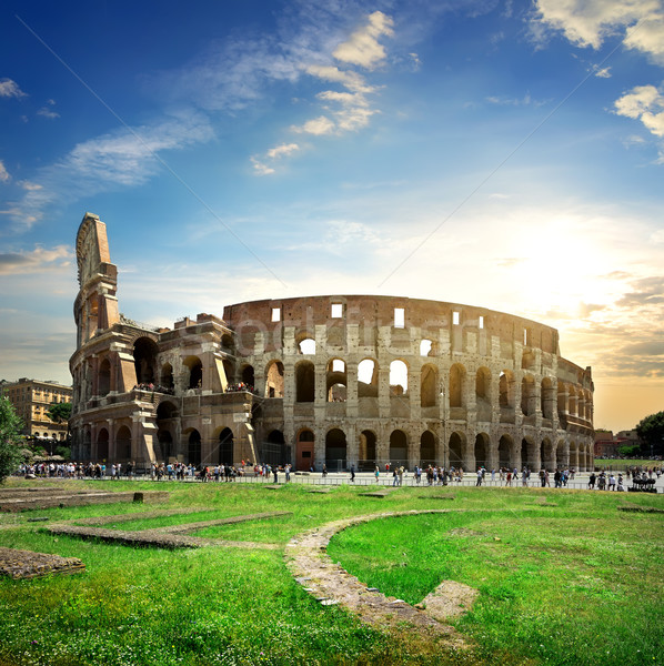 Great colosseum at sunset Stock photo © Givaga