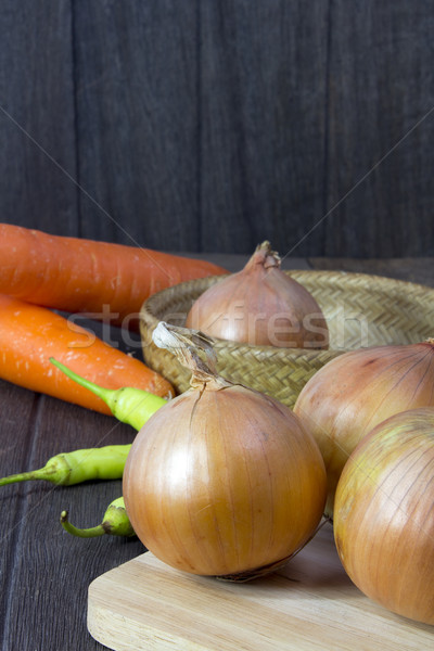 set fresh vegetables with green leaf on a wooden floor. Stock photo © Gloszilla