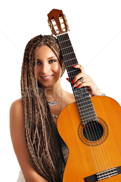 Stock photo: beautiful girl with dreadlocks hair and guitar