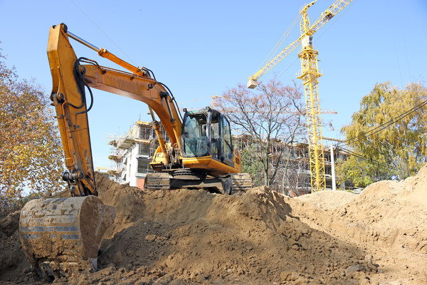 excavator on construction site industry Stock photo © goce