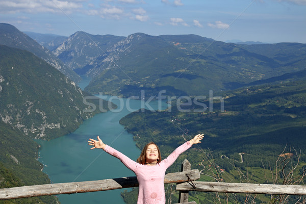 happy little girl enjoy in nature on mountain Stock photo © goce