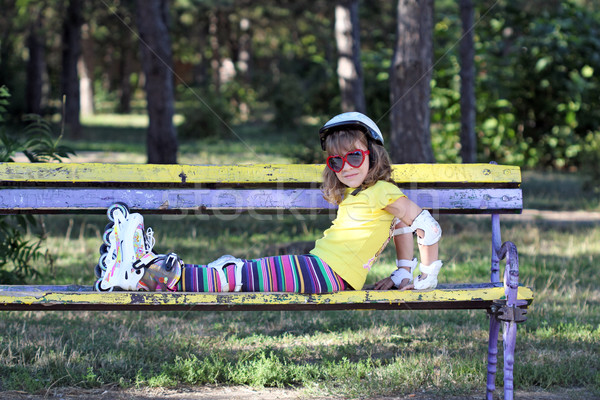 little girl with roller skates in park Stock photo © goce