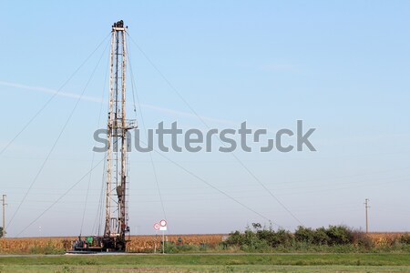 oilfield with oil drilling rig Stock photo © goce