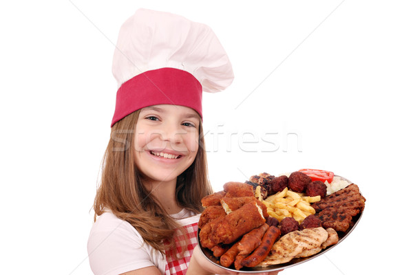 Feliz little girl cozinhar carne grelhada salada prato Foto stock © goce