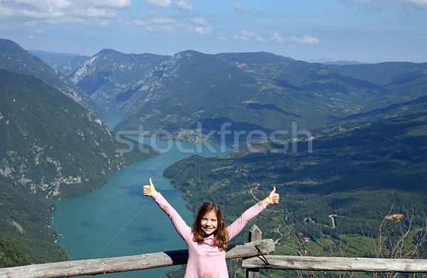 little girl with thumbs up on Tara mountain viewpoint Stock photo © goce