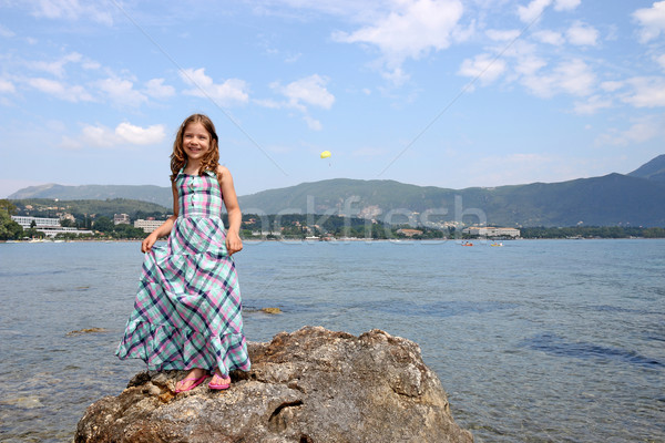 happy little girl standing on rock near sea Corfu island summer  Stock photo © goce