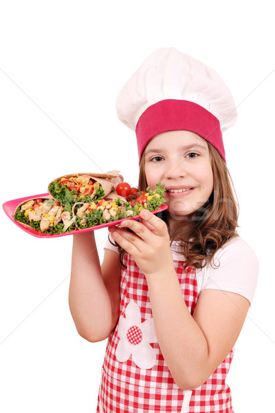 happy little girl cook with burritos Stock photo © goce