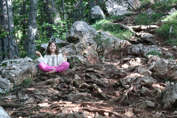 little girl meditating in the forest  Stock photo © goce