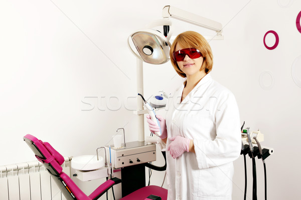 female dentist with equipment in dental office Stock photo © goce