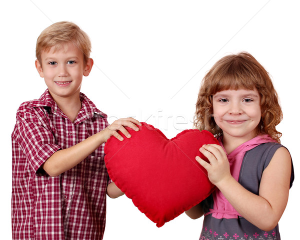 boy and little girl holding big red heart Stock photo © goce