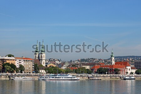 Danube riverside with churches buildings and boats Budapest Hung Stock photo © goce