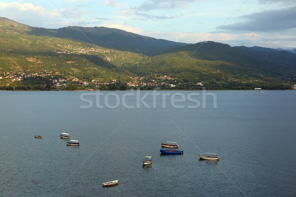 Barcos lago crepúsculo paisaje agua montana Foto stock © goce
