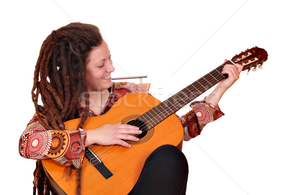 girl with dreadlocks hair play acoustic guitar Stock photo © goce