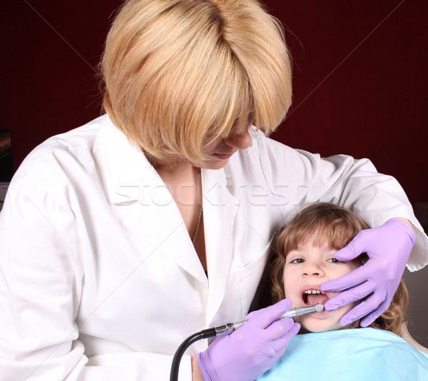 dentist perform a dental exam Stock photo © goce