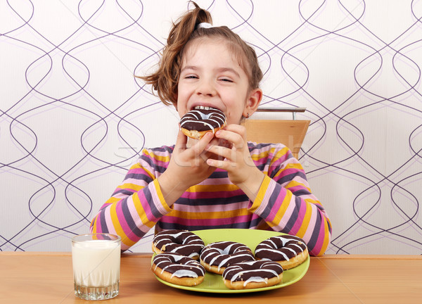 飢えた 女の子 食べる チョコレート ドーナツ 食品 ストックフォト © goce