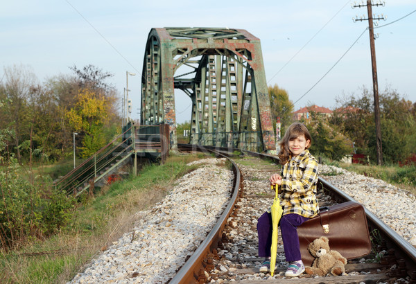 beautiful little girl sitting on suitcase Stock photo © goce