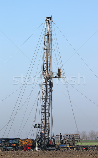 oil drilling rig and oil workers Stock photo © goce