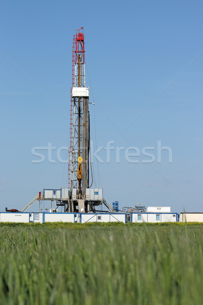 land oil drilling rig on green field Stock photo © goce