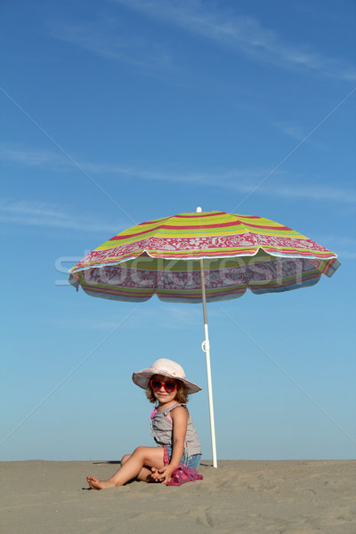 little girl under sunshade Stock photo © goce