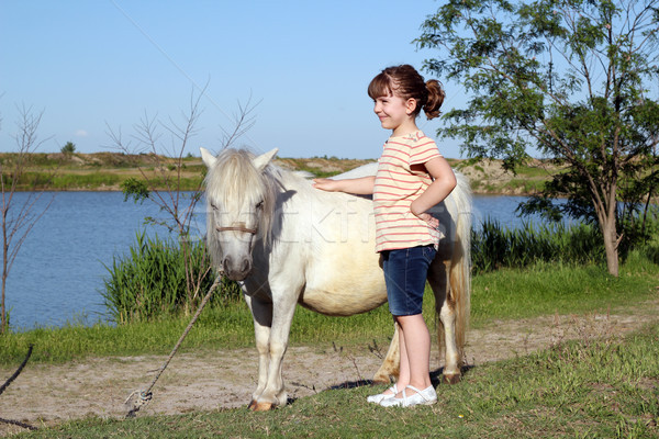 Feliz little girl pónei cavalo água menina Foto stock © goce