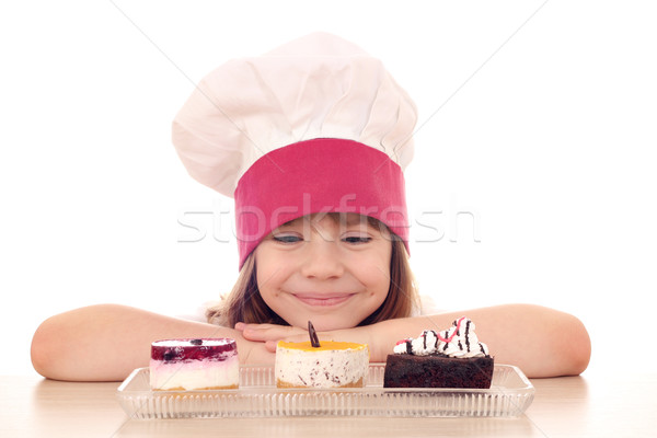 little girl cook with sweet cakes Stock photo © goce