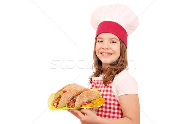 Mutlu küçük kız pişirmek tacos kız gülümseme Stok fotoğraf © goce