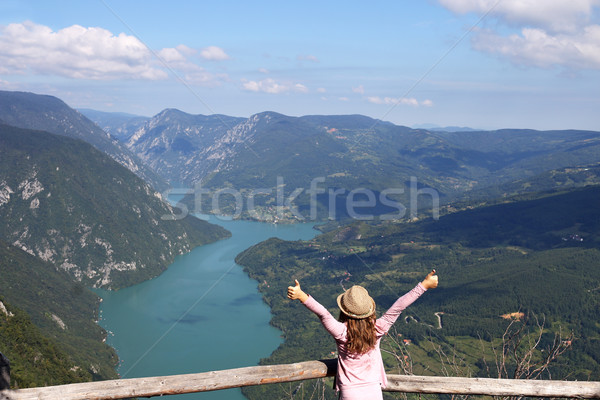 little girl with thumbs up standing on mountain viewpoint Stock photo © goce
