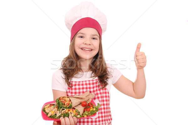 Happy little girl cook with burritos and thumb up Stock photo © goce