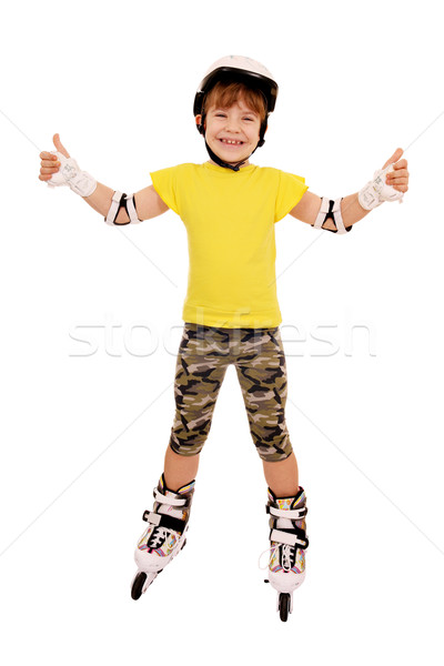 little girl with roller skates and thumbs up Stock photo © goce