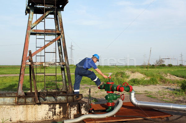 oil worker check pipeline on oilfield Stock photo © goce