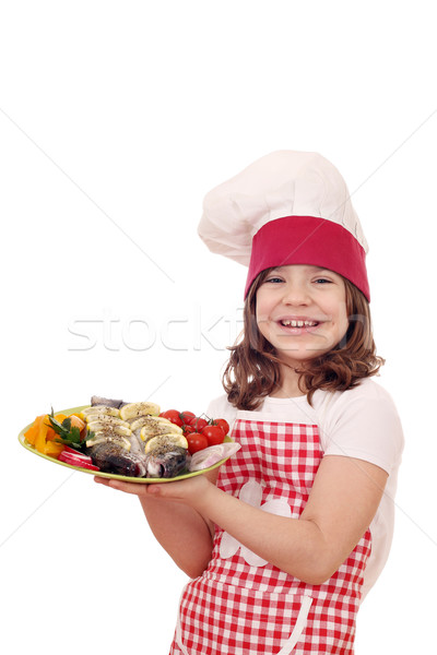 Gelukkig meisje kok forel vis plaat Stockfoto © goce