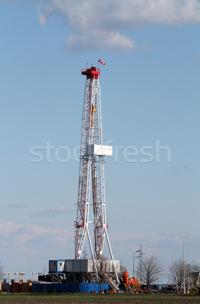 Stock photo: land oil drilling rig on field