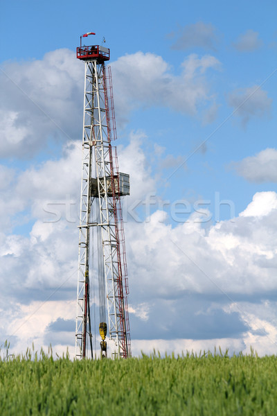 oil drilling rig and blue sky Stock photo © goce