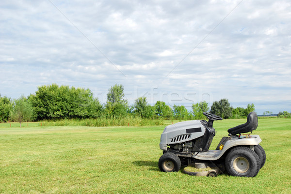 Stock photo: lawn with lawn mower