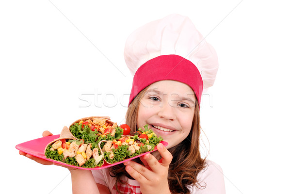 Little girl cook with burritos Stock photo © goce
