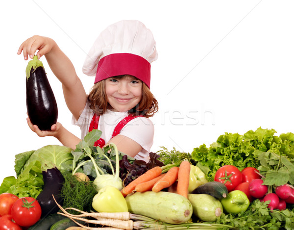 Stock photo: little girl cook holding aubergine