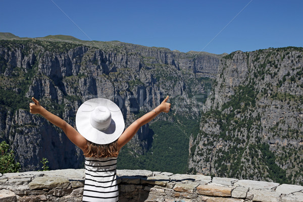 girl with thumbs up on the viewpoint Vikos gorge Greece Stock photo © goce