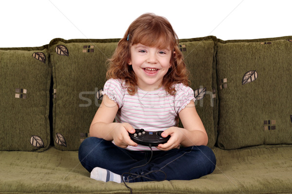 happy little girl play video game Stock photo © goce