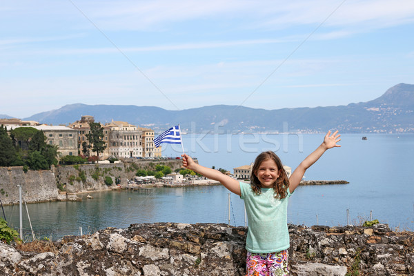 happy little girl with Greek flag on summer vacation Corfu town  Stock photo © goce