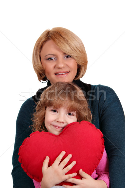 happy mother and daughter with heart family scene Stock photo © goce