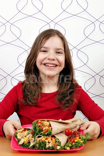 happy little girl eat burritos Stock photo © goce