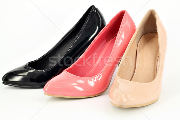 ocher pink and black women shoes on white Stock photo © goce