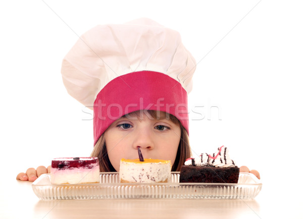 little girl cook looking at cookies Stock photo © goce