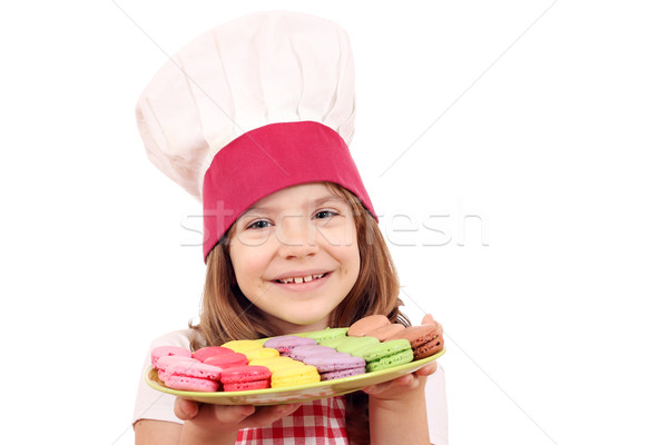 little girl cook hold plate with macarons Stock photo © goce