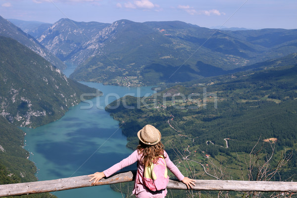 Stock photo: little girl hiker on mountain viewpoint
